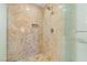 Luxurious walk-in shower featuring marble-style tile, rainfall shower head, and modern fixtures at 2000 N Fashion Show Dr # 4318, Las Vegas, NV 89109