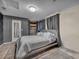 Bedroom featuring a queen sized bed, wall to wall carpeting, gray curtains, and closet with mirrored door at 2200 S Fort Apache Rd # 2041, Las Vegas, NV 89117