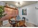 Bright dining room with a modern glass table and stylish seating with unique décor at 2200 S Fort Apache Rd # 2041, Las Vegas, NV 89117