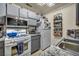 Functional kitchen equipped with white appliances, granite counters, and plenty of storage at 2200 S Fort Apache Rd # 2041, Las Vegas, NV 89117