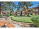 Community putting green surrounded by lush landscaping and well maintained grounds at 2200 S Fort Apache Rd # 2041, Las Vegas, NV 89117