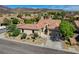 Beautiful aerial view of a single-story home with desert landscaping in a suburban neighborhood at 2333 Indigo Island St, Henderson, NV 89044