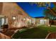 Scenic backyard features a lush lawn, mature trees, and attractive landscaping at 2333 Indigo Island St, Henderson, NV 89044