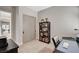 This home office features a desk, shelving, and a closet with sliding doors at 2333 Indigo Island St, Henderson, NV 89044