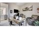 Comfortable office with a window, desk, a leather chair and aviation-themed decor at 2333 Indigo Island St, Henderson, NV 89044