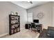 Cozy office space features a sleek desk, stylish shelving, and a comfortable workspace for productivity at 2333 Indigo Island St, Henderson, NV 89044