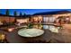 Backyard showcases a luxurious spa and pool with seamlessly integrated outdoor living space at 2333 Indigo Island St, Henderson, NV 89044