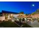 Backyard with pool, hot tub, fire pit, patio, outdoor seating, and lush landscaping at 2333 Indigo Island St, Henderson, NV 89044
