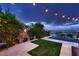 Lush backyard with manicured landscaping, perfect for enjoying the outdoors in a serene setting at 2786 Scotts Valley Dr, Henderson, NV 89052