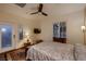 Bedroom featuring cozy carpeting, a ceiling fan, and access to the exterior at 2786 Scotts Valley Dr, Henderson, NV 89052