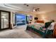 Comfortable carpeted main bedroom with access to an outdoor space at 2786 Scotts Valley Dr, Henderson, NV 89052