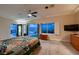 Spacious main bedroom with a ceiling fan and access to an outdoor space at 2786 Scotts Valley Dr, Henderson, NV 89052