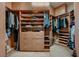 Organized walk-in closet with shelves and hanging rods at 2786 Scotts Valley Dr, Henderson, NV 89052
