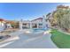Spacious backyard featuring a pool, spa, covered patio, and well-maintained landscaping at 2868 Vista Del Sol Ave, Las Vegas, NV 89120