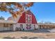 The charming red and white barn features the 'Sierra Vista Ranchos' logo and multiple access points at 2868 Vista Del Sol Ave, Las Vegas, NV 89120
