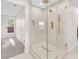 Modern bathroom with a glass-enclosed shower, gold fixtures, and contemporary design at 2868 Vista Del Sol Ave, Las Vegas, NV 89120