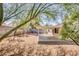 Backyard with covered patio offers outdoor living and entertaining at 3129 White Rose Way, Henderson, NV 89014
