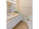 Bathroom with a single vanity, tiled floor, and toilet at 3129 White Rose Way, Henderson, NV 89014