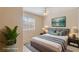 Well staged bedroom showcasing updated fixtures and neutral paint at 3129 White Rose Way, Henderson, NV 89014