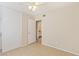 Bedroom with a large closet and tiled floors at 3129 White Rose Way, Henderson, NV 89014