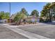 Well-maintained single story home with a two-car garage and mature landscaping at 3129 White Rose Way, Henderson, NV 89014