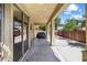 Covered patio with a grill and view of the backyard at 3405 Brook Song Ave, North Las Vegas, NV 89081