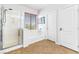 Bathroom with a glass shower, soaking tub, and tile floors at 3405 Brook Song Ave, North Las Vegas, NV 89081