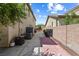 Side yard with AC unit and space for storage at 3405 Brook Song Ave, North Las Vegas, NV 89081