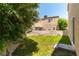 The backyard has a well-maintained lawn area, great for outdoor activities and entertainment at 3425 Yorkminster St, Las Vegas, NV 89129