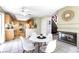 Bright dining area with a fireplace and access to the backyard at 3425 Yorkminster St, Las Vegas, NV 89129