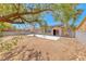 Spacious backyard with a concrete patio and shade trees at 3604 Cantura Crest Ct, North Las Vegas, NV 89031