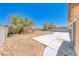Spacious backyard offers a concrete patio and plenty of room for activities at 3604 Cantura Crest Ct, North Las Vegas, NV 89031