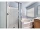 Bathroom with a tiled shower, soaking tub, and modern fixtures at 3604 Cantura Crest Ct, North Las Vegas, NV 89031