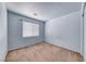 This carpeted bedroom has a window for natural light at 3604 Cantura Crest Ct, North Las Vegas, NV 89031