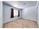 Simple bedroom with a window and carpeted flooring at 3604 Cantura Crest Ct, North Las Vegas, NV 89031