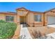Charming single-story home with well-kept landscaping and cozy front entrance at 3604 Cantura Crest Ct, North Las Vegas, NV 89031