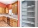 Kitchen with stainless steel appliances, tile backsplash, and pantry at 3604 Cantura Crest Ct, North Las Vegas, NV 89031