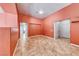 Open living room with tile flooring, doorways, and neutral wall color at 3604 Cantura Crest Ct, North Las Vegas, NV 89031