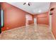 Open-concept living space with tile flooring, doorways, and ample natural light at 3604 Cantura Crest Ct, North Las Vegas, NV 89031