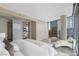 Bright bedroom featuring large windows with city views and a cozy lounge area at 3722 Las Vegas Boulevard S Blvd # 2609, Las Vegas, NV 89158