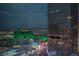Spectacular city view featuring illuminated buildings, vibrant cityscape, and distant mountain range at 3722 Las Vegas Boulevard S Blvd # 2609, Las Vegas, NV 89158