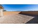 Spacious backyard with a wall, offering privacy and space for outdoor activities at 3921 Painted Lady Ave, Las Vegas, NV 89141