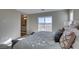 Bright bedroom with a sliding glass door leading to a balcony and views at 3921 Painted Lady Ave, Las Vegas, NV 89141