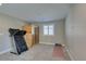 Carpeted bonus room showcasing a treadmill, yoga mat, and sauna for wellness at 3921 Painted Lady Ave, Las Vegas, NV 89141