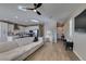 Spacious living room boasts an open layout, connecting seamlessly to the kitchen with sleek, modern finishes and fixtures at 3921 Painted Lady Ave, Las Vegas, NV 89141