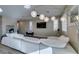 Modern living space with hardwood floors, contemporary decor, and a comfortable white sectional at 3921 Painted Lady Ave, Las Vegas, NV 89141