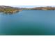 Scenic view of the lake surrounded by desert landscaping and mountains at 4 Via Centrale # 1, Henderson, NV 89011