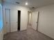 Bedroom features carpet, neutral walls, and a closet with sliding doors for ample storage at 4266 Yucca Brevi Ave, Las Vegas, NV 89139