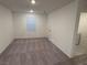 Cozy bedroom featuring carpet flooring, closet space, and a large window with blinds at 4266 Yucca Brevi Ave, Las Vegas, NV 89139