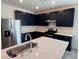 Modern kitchen with stainless steel appliances, and ample cabinet space at 4266 Yucca Brevi Ave, Las Vegas, NV 89139